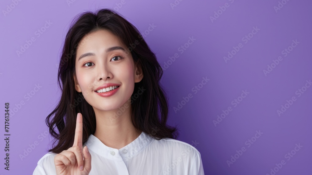 A beautiful young woman holding a toothbrush. Perfect for dental hygiene and healthcare concepts A beautiful young woman holding a toothbrush. Perfect for dental hygiene and healthcare concepts