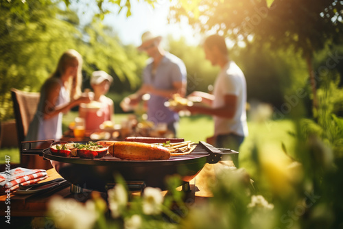 a photo of a family and friends having a picnic barbeque grill in the garden. having fun eating and enjoying time. sunny day in the summer. blur background.