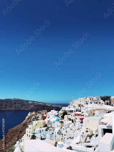 Fototapeta Naklejka Na Ścianę i Meble -  Amazing panorama view of beautiful Oia town on Santorini volcanic island, Greece