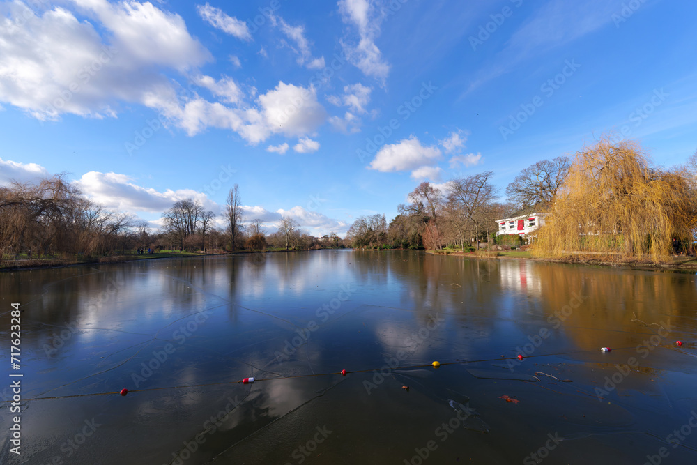 The frozen Daumesnil lake at Bois de Vincennes in the 12th arrondissement of Paris city The frozen Daumesnil lake at Bois de Vincennes in the 12th arrondissement of Paris city