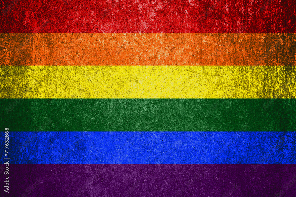 Close-up of the grunge LGBT  flag. Dirty LGBT  flag on a metal surface.
