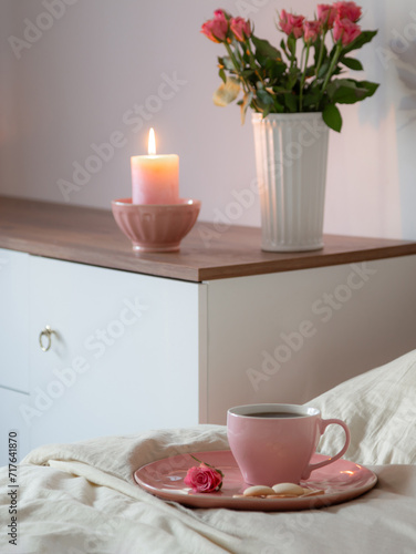 Wallpaper Mural pink cup of coffee on bed with flowers in vase  in white bedroom Torontodigital.ca