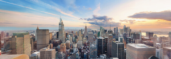big skyline panorama of New York City after sunset at night with a view of empire state building
