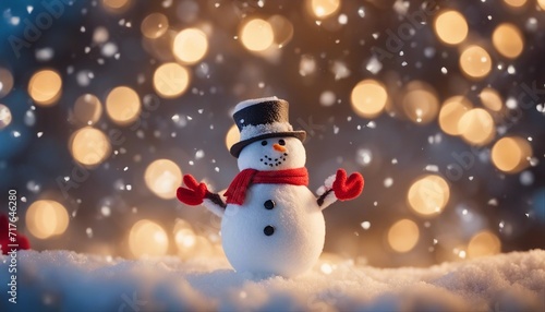 Christmas winter background with snowman in snow and blurred bokeh background  © abu