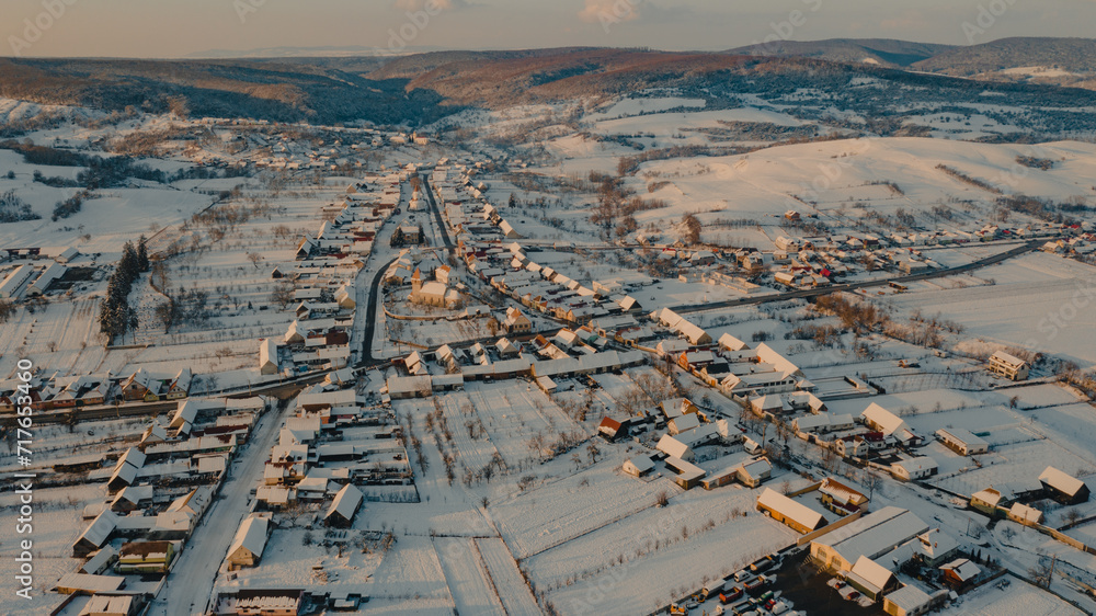 Aerial view of a snow-covered idyllic village in Romania