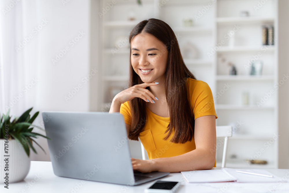 Freelance Work. Happy Young Asian Woman Working On Computer At Home Office Freelance Work. Happy Young Asian Woman Working On Computer At Home Office
