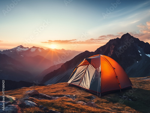 Camping high in the mountains during sunset