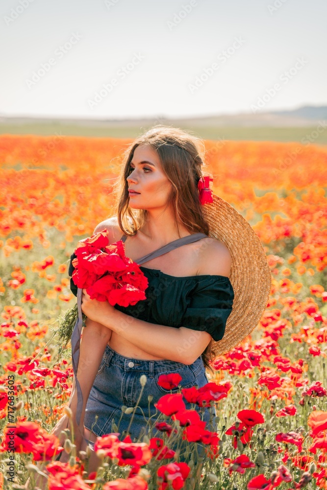 Woman poppies field. portrait happy woman with long hair in a poppy field and enjoying the beauty of nature in a warm summer day. Woman poppies field. portrait happy woman with long hair in a poppy field and enjoying the beauty of nature in a warm summer day.