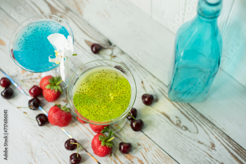 Cocktail with flavored ice with chia seeds on a light wooden background. slushy drink photo