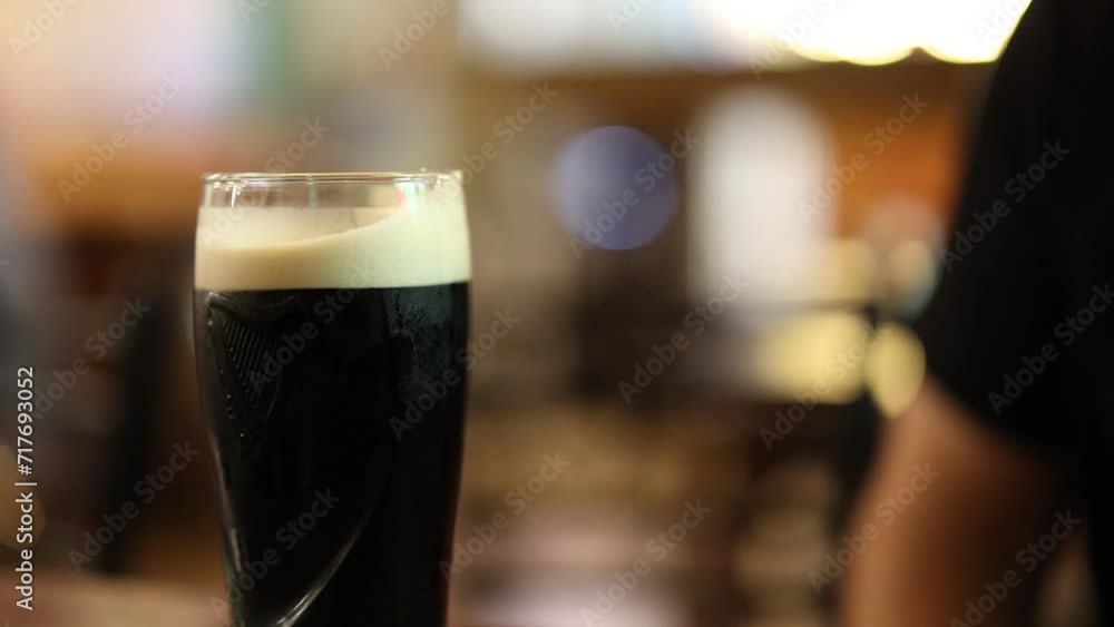 Pouring a Pint of Dark Beer Pouring a Pint of Dark Beer