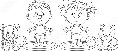 Happy little boy and girl doing morning exercises in their playroom of a kindergarten, black and white vector cartoon illustration for a coloring book