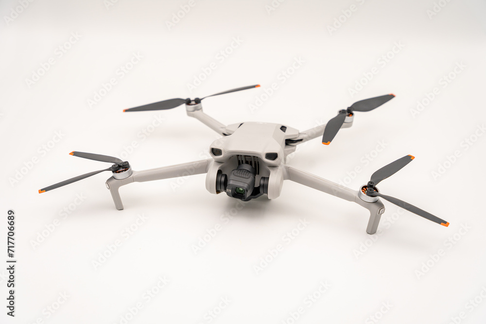 four-winged camera drone in front of a white backgroundisolated four-winged camera drone in front of a white backgroundisolated
