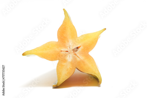 Half cut fresh organic star fruit delicious front view isolated on white background clipping path