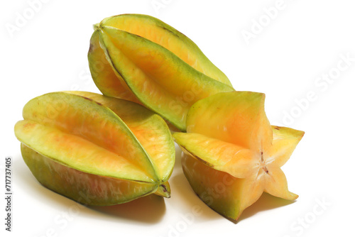 Half cut and two whole fresh organic star fruit delicious isolated on white background clipping path