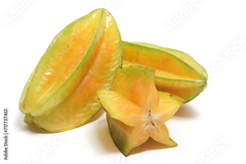 Half cut and two whole fresh organic star fruit delicious isolated on white background clipping path