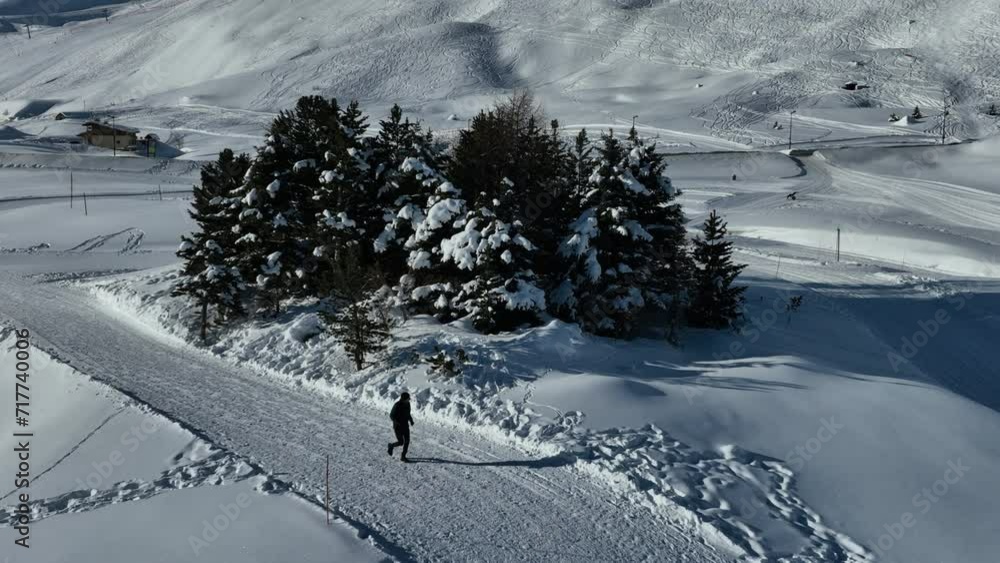 Winter drone shot of ski pistes and slopes covered with fresh powder snow in Tignes in Valdisere France Winter drone shot of ski pistes and slopes covered with fresh powder snow in Tignes in Valdisere France