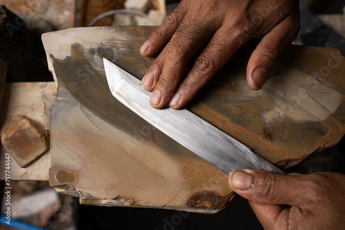 making tanto knife process with wet stone photo