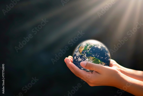 Close up hands of woman holding earth. Eco and conservation of environmental concept.
