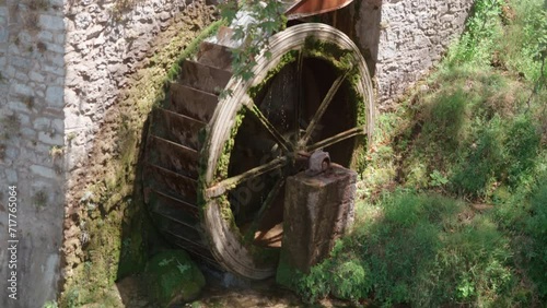 Rotating waterwheel in Kyra Springs. photo
