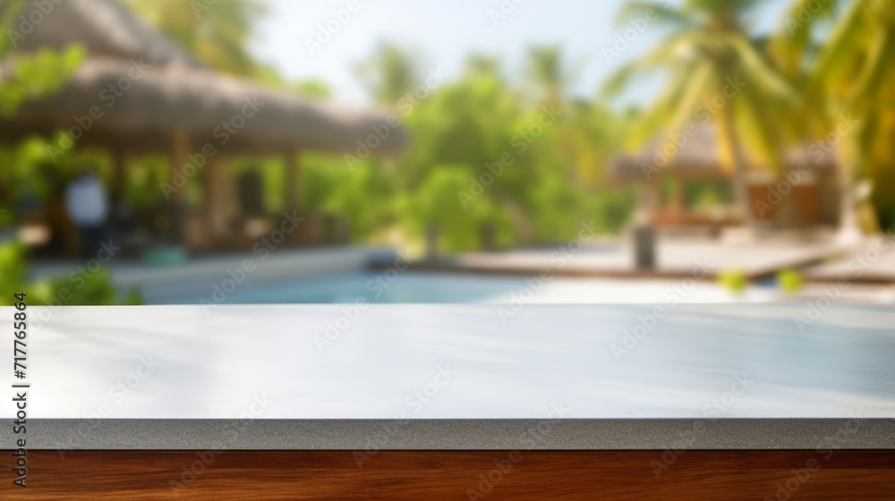 an empty table top of an outdoor cafe on a blurred tropical background. copy space.