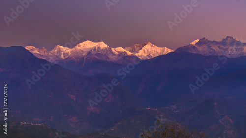 A view of Snow clad Kangchenjunga, also spelled Kanchenjunga,the third highest mountain in the world, at the time of Sunrise. © ABIR