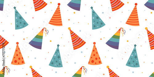 Seamless holiday pattern with colorful party hats on white background