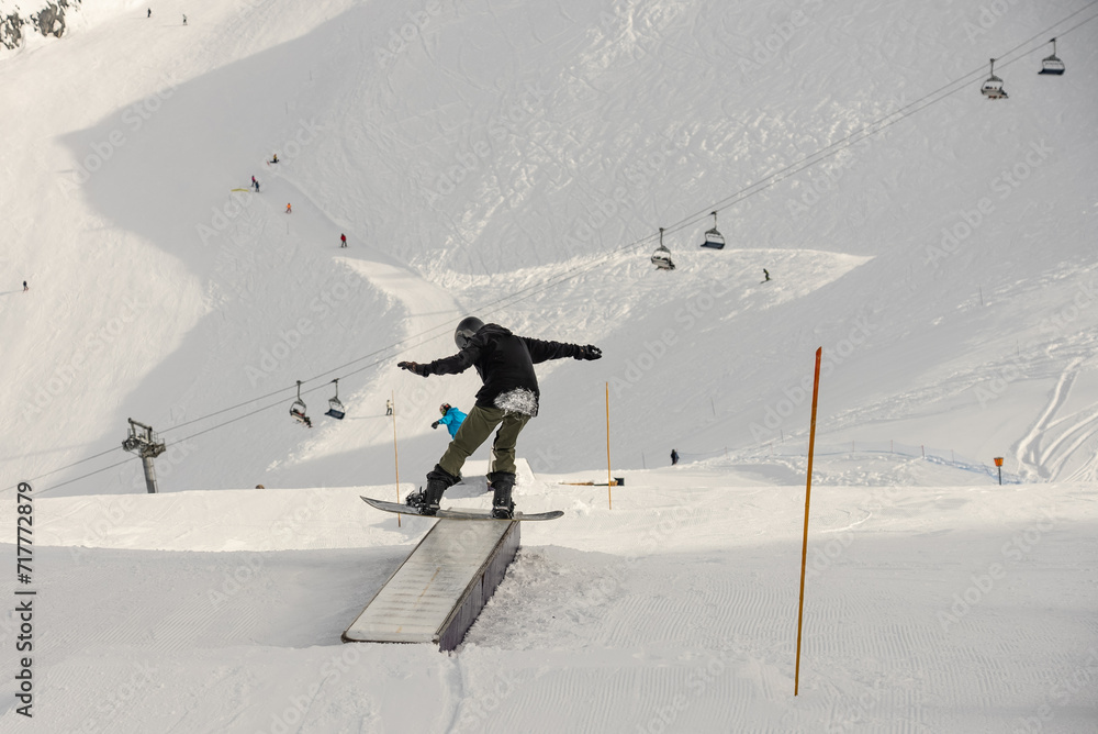 custom made wallpaper toronto digitalSnowboarder in the park on a box. Snow park box tricks. Winter jibbing in snwopark in France.