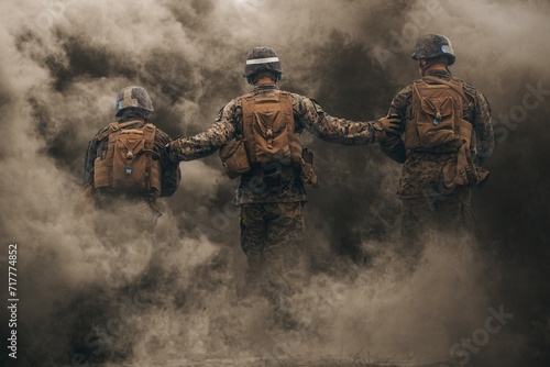 Special forces and military soldiers between smoke and gas in battlefield	
