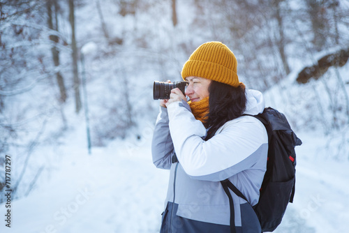 Woman Photographer Taking A Photograph In Nature