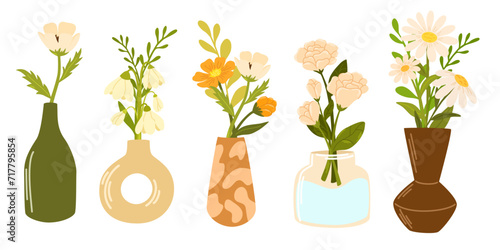 Spring blooming flowers in vases and bottles set. Garden flowers and summer wildflowers, tulips and daisies, cornflowers and roses. Beautiful blossom Romantic cartoon flat vector illustration. 