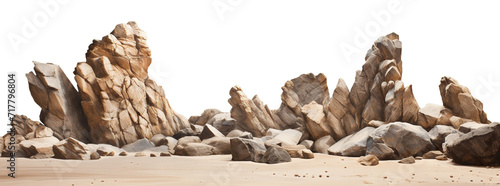 Varied rock formations arranged on a smooth sand surface, cut out