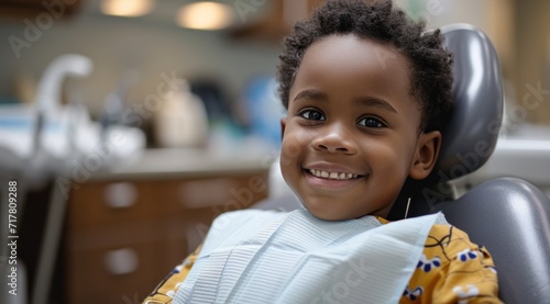 one child smiling in the dental chair,