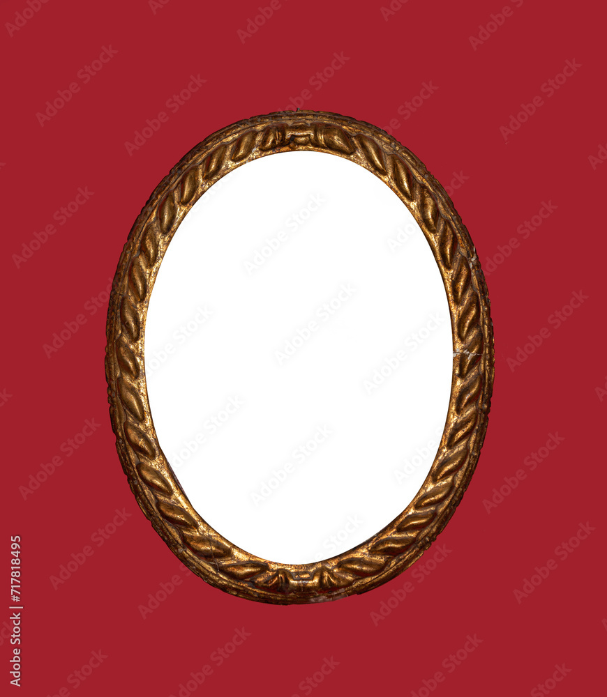 Antique old gold frame on red background. Gold picture frame. Antique old gold frame on red background. Gold picture frame.