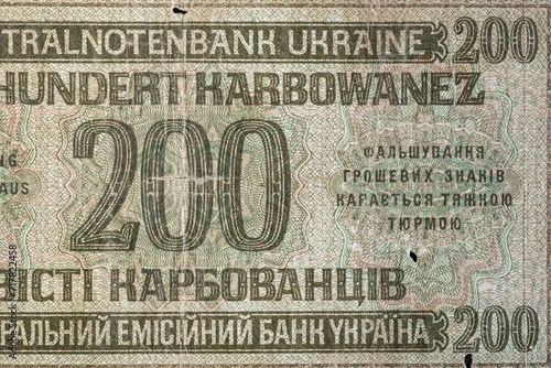 Vintage elements of old paper banknotes.Old 200 karbovanez bill of Ukraine. Occupying the money of the German Reich in 1941,Rovno