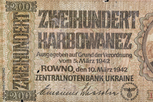 Vintage elements of old paper banknotes.Old 200 karbovanez bill of Ukraine. Occupying the money of the German Reich in 1941,Rovno