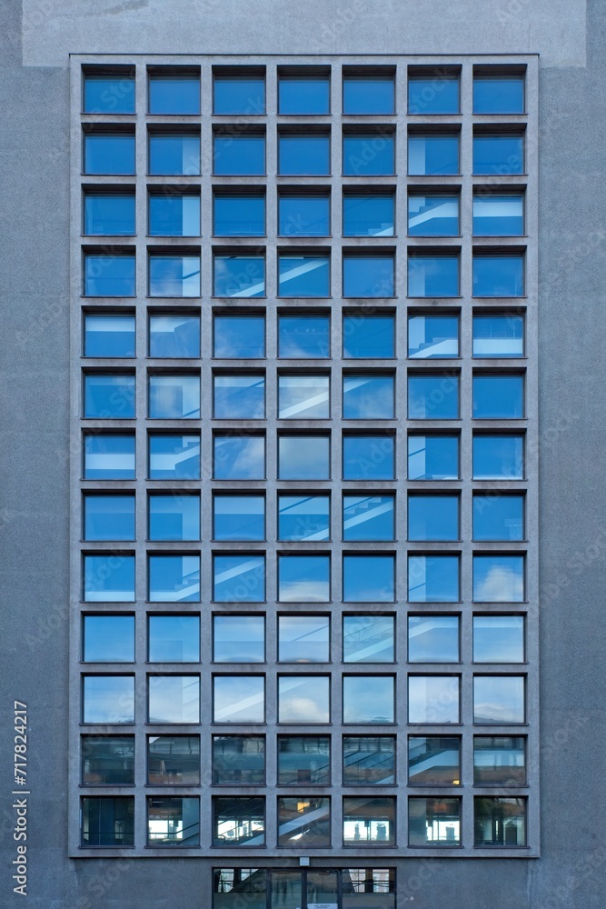 Multiple small windows on a building.