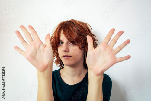 beautiful teenage girl with a stylish short anime hairstyle on a light background