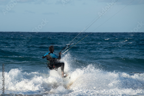 Kite surfing.Windsurf.Kite boarding. To fly a kite. Surfers of all ages train in the Mediterranean. Flying a kite on the beaches of Cyprus. © osman