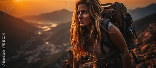 young woman Climber on sunset © KRIS
