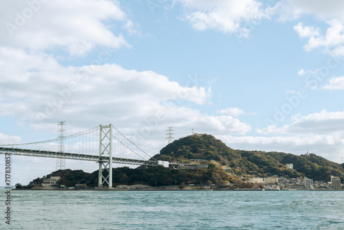 Shimonoseki Kanmon bridge and Kitakyushu Moji in Yamaguchi, Japan photo