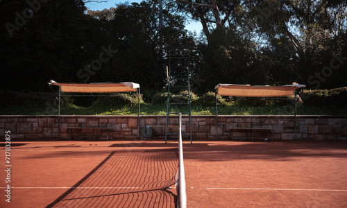Old tennis club, clay court symmetric on the woods photo