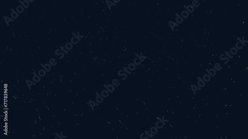 Dark background with small particles in yellow