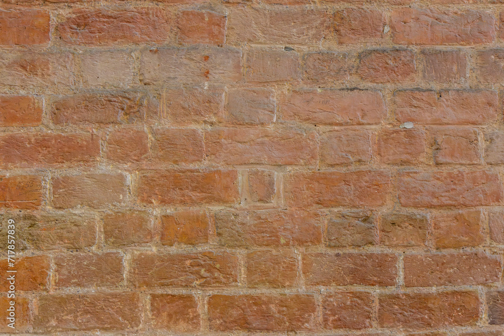 Obraz premium Rostrote Backsteinwand Hintergrund
