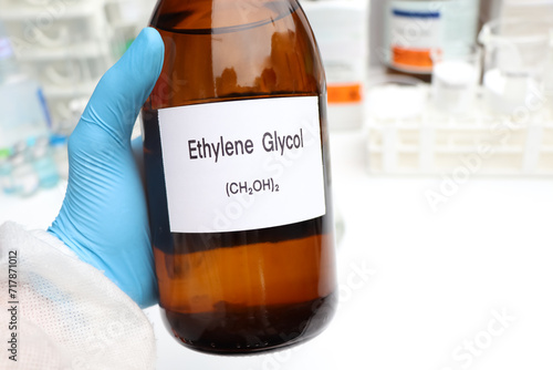 Ethylene Glycol in container, chemical analysis in laboratory photo