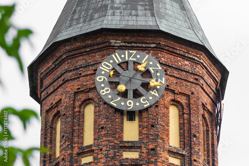 Clock tower of Konigsberg Cathedral. Brick Gothic-style monument in Kaliningrad, Russia. photo