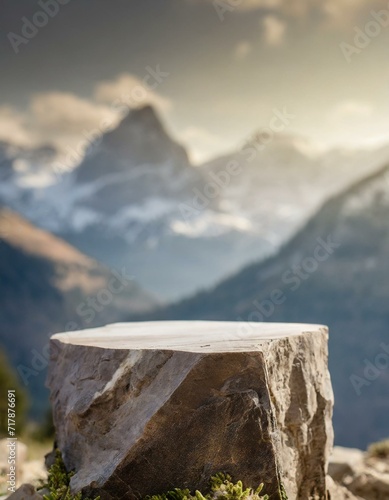 Mountain display with empty stone podium photo