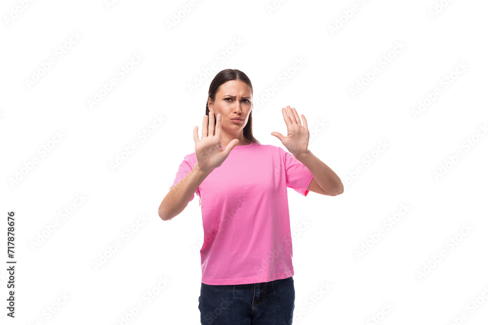 young pensive model woman with straight black hair dressed in a pink t-shirt is excited young pensive model woman with straight black hair dressed in a pink t-shirt is excited