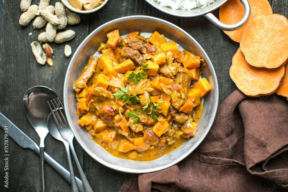 African chicken peanut stew with sweet potatoes with side of basmati rice African chicken peanut stew with sweet potatoes with side of basmati rice