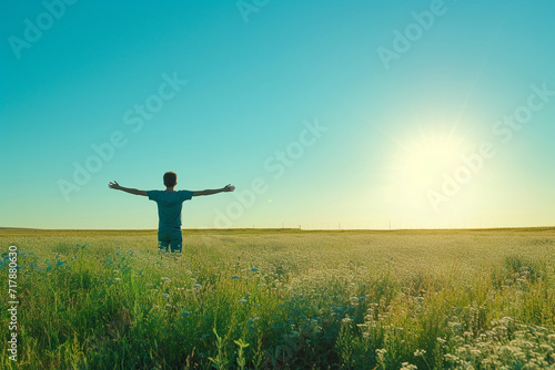 person standing in an open field with arms outstretched, basking in the eternal sunshine, symbolizing a sense of freedom and clarity of thought in a minimalistic style photo