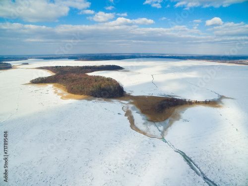 Upalty island on the frozen Mamry lake, Mazury, Poland photo